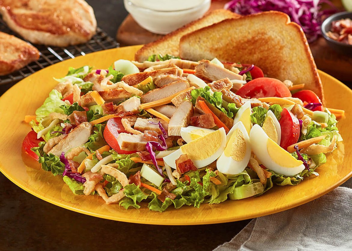 ZaxbysWestBroad's tweet photo. The Cobb Zalad includes mixed greens, red cabbage and carrots topped with grilled chicken, Roma tomatoes, cucumbers, bacon, hard-boiled egg, fried onions, cheddar and Jack cheeses with Texas Toast. Try it today with Lite Ranch Dressing. Choose between Fried, Grilled, or Garden. https://t.co/qz7jsv8p0k