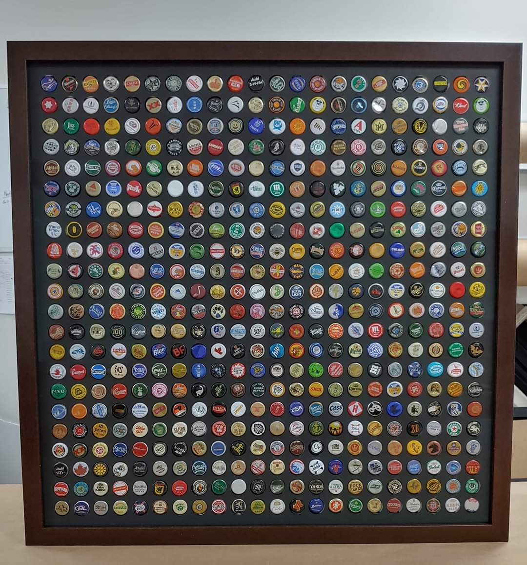 MFCAuthentics's tweet photo. Have you ever wondered what 484 bottle caps look like framed with @truvueglazing Museum glass?! 

Now you know!

We hope everyone had a wonderful holiday week. We enjoyed framing so many awesome pictures and products for you this season! 🎉⛄
#larsonjuhl https://t.co/vSgf5r3stx