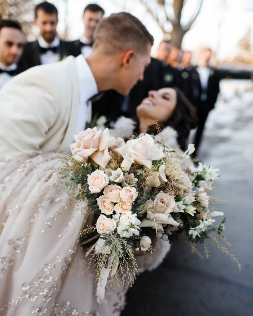 The cold air of a winter wedding makes the warm embrace of #love that much stronger. #newfields #winterweddings  #winterweddinginspiration