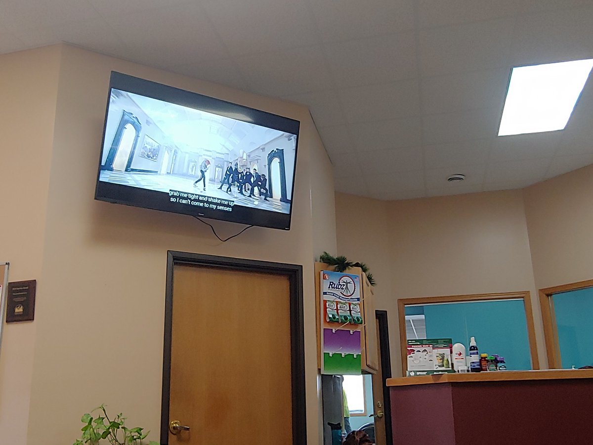 Nikkityknack76's tweet photo. When the CEO decides the waiting room needs a big ass TV and then puts me in charge of the remote. 
Im about to add some serious culture to these rural Minnesotans lives. 
@BTS_twt https://t.co/PQH4zpUwhn