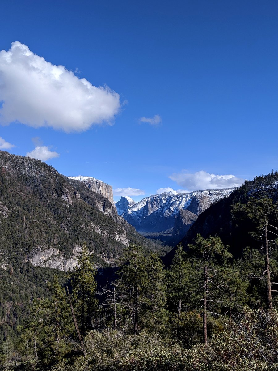 snow-dusted view of Yosemite Valley, including El Capitan and Half Dome