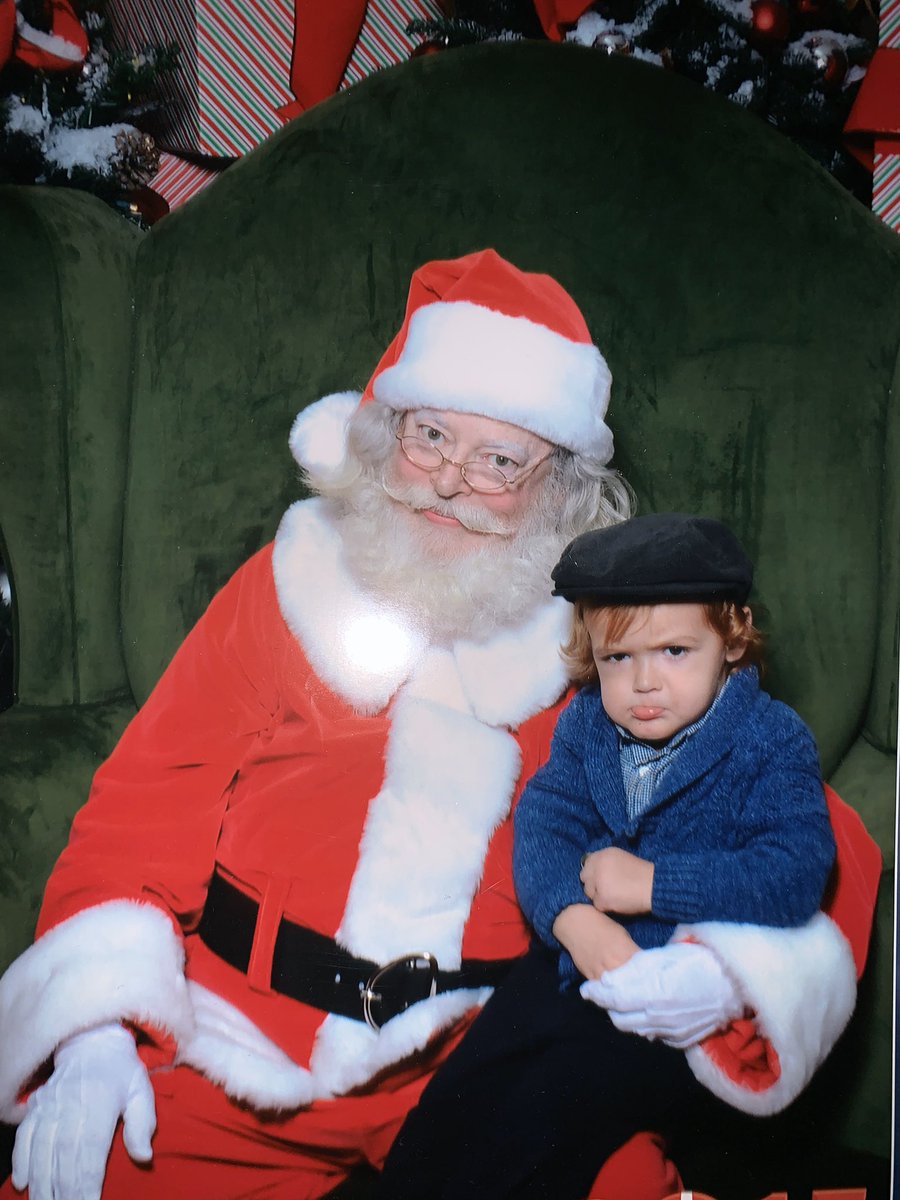 We didn’t get around to a Santa pic this year, so I’m just gonna leave a old favorite here for the laughs. #2yrsold #whatisthatface