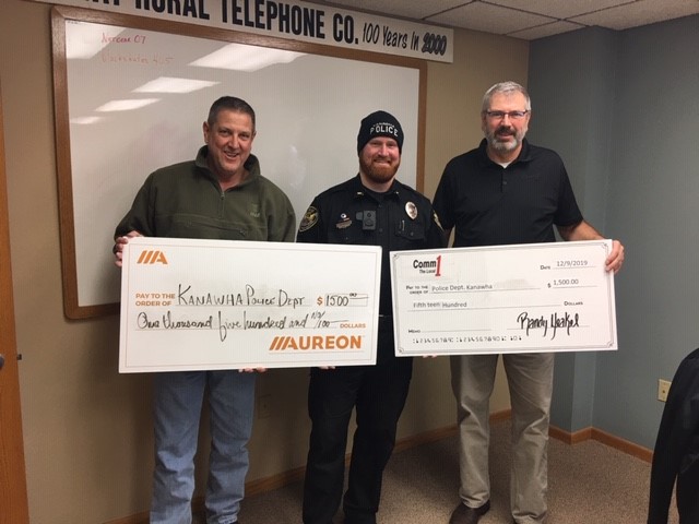 A charity grant of $1,500 was presented with Comm1 to Police Chief Anthony Rassmussen on behalf of the Kanawha Police Department. The funds will go toward new police uniforms, Kevlar vests and a service revolver. #AureonCares