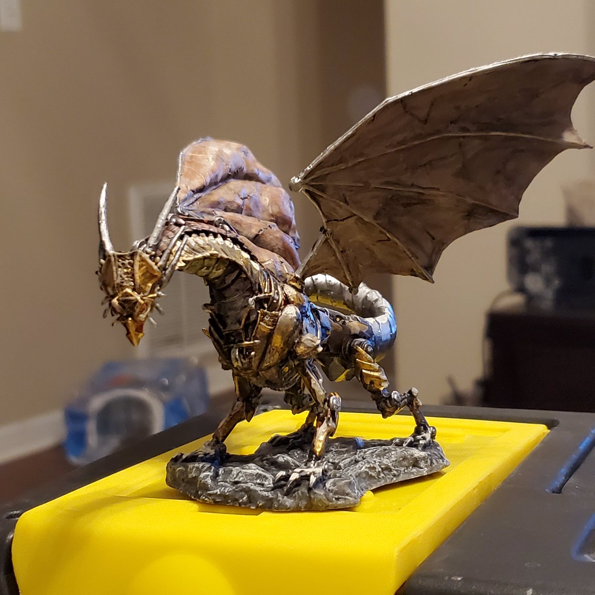 captrosko's tweet photo. I saw this beauty and had to buy and paint him.   #dndminiatures #dnd #handpainted #clockworkdragon #dragon https://t.co/Hn7AJFSuS6