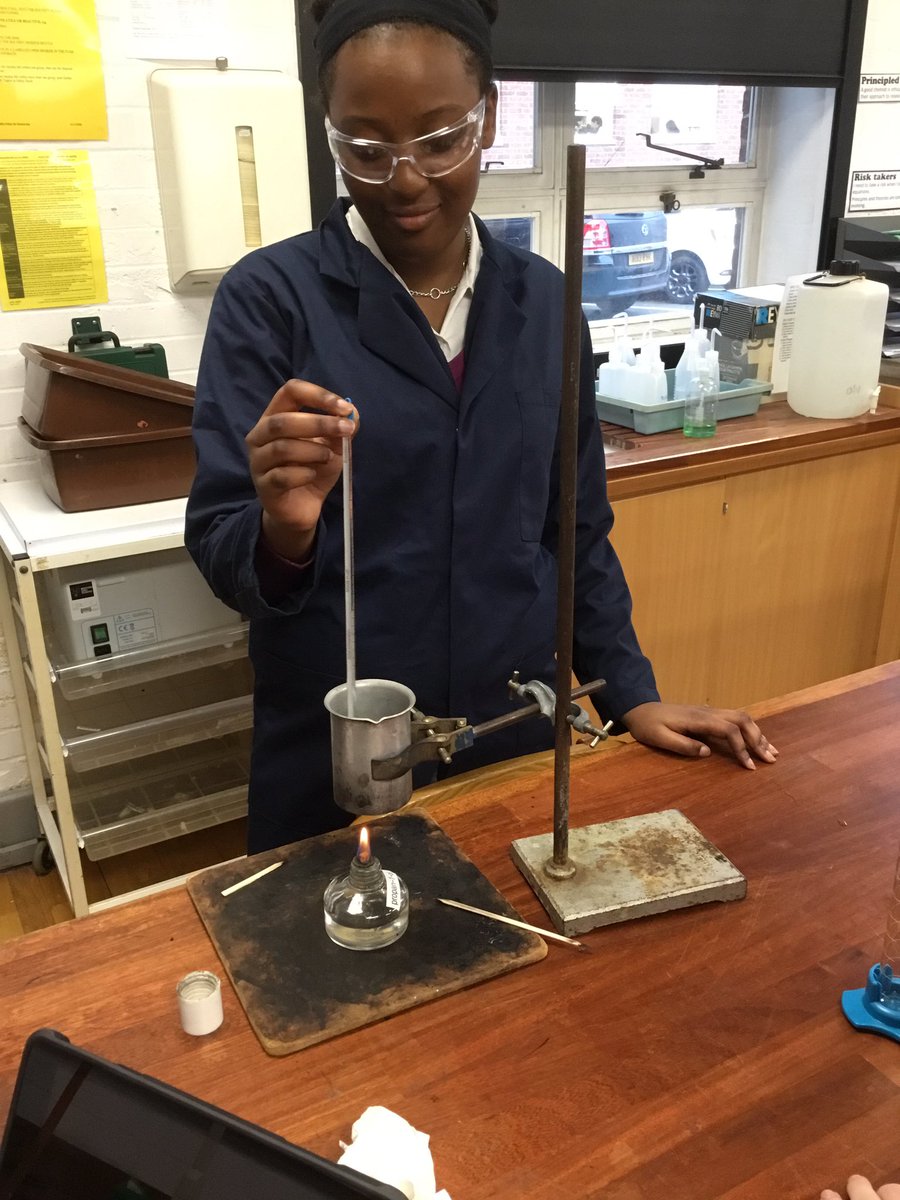 BGS_Chemistry's tweet photo. Year 10 girls are measuring the enthalpy change of burning fuels using calorimetery. They have been finding connections between @BGSBiologyDept and Chemistry as they realised they have used this method in Year 9 when burning crisps! #HPL #calorimetry #connectionfinding https://t.co/fMi1PdKgfV