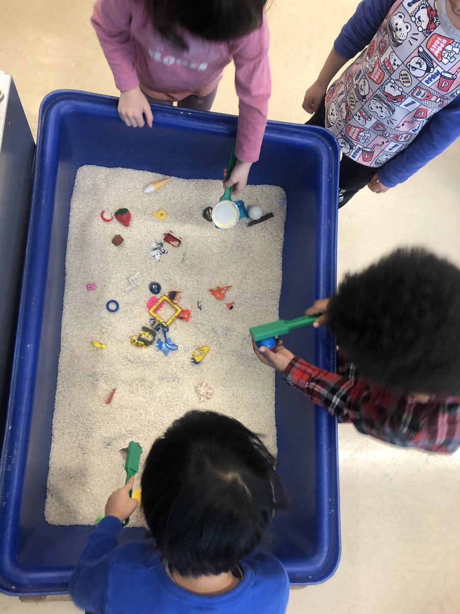 MsSarahWebb's tweet photo. We sure love the newest addition to our class: the rice table! We use magnetic wands to “fish” for magnetic objects in the rice. https://t.co/qzuQWTJS4H