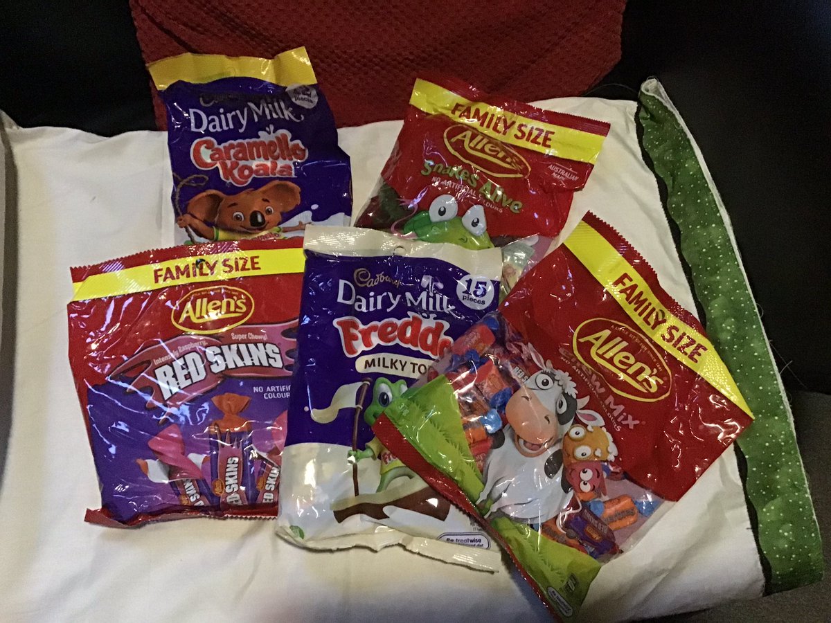 NarrowboatChef's tweet photo. Christmas has come again! Maggie’s dad has just arrived from Australia for a visit and brought a care package of some of our favourite Aussie sweets! Sorry, but Aussie Cadbury’s is better than UK Cadbury in our opinion! #SorryNotSorry #Freddofrog @CadburyAU https://t.co/8grEM5KvMt