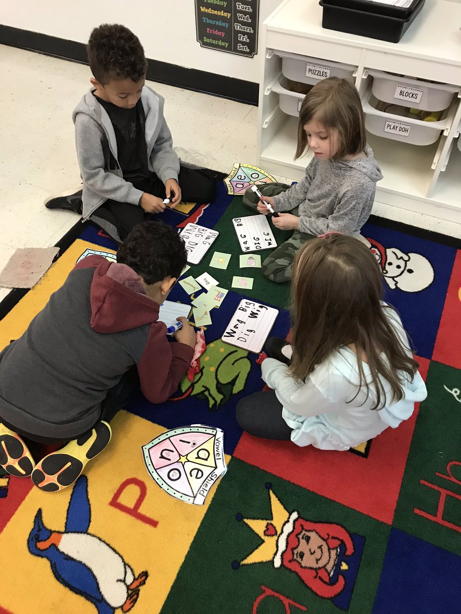SarahJaneJone14's tweet photo. Fun with phonics today in @c_ljayne ‘s classroom. Loved seeing these kiddos work together with their vowel shields to read and write vowel sounds! Keep up the great work kindergarteners!! #CCEistheplace2be https://t.co/vI7rH32BPx