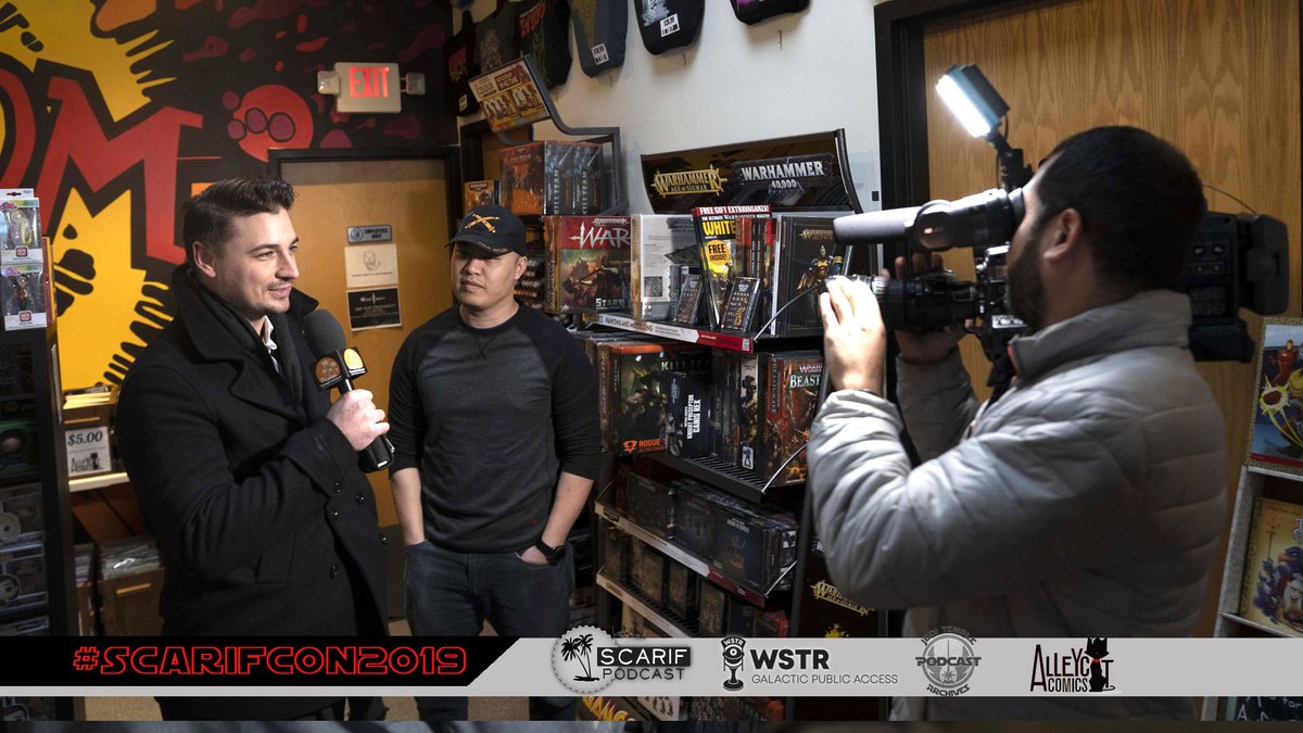 ScarifPodcast's tweet photo. Things have been super crazy and we haven't forgotten that we still have to finish up that recap video for #ScarifCon2019. #ComingSoon @IEntanglements @VuYoshi @WSTRmedia @JtaPodcast @michelleblahnik @alleycatcomics #DeployTheVideo @SPI_tv_Media https://t.co/jiFPQWOo55