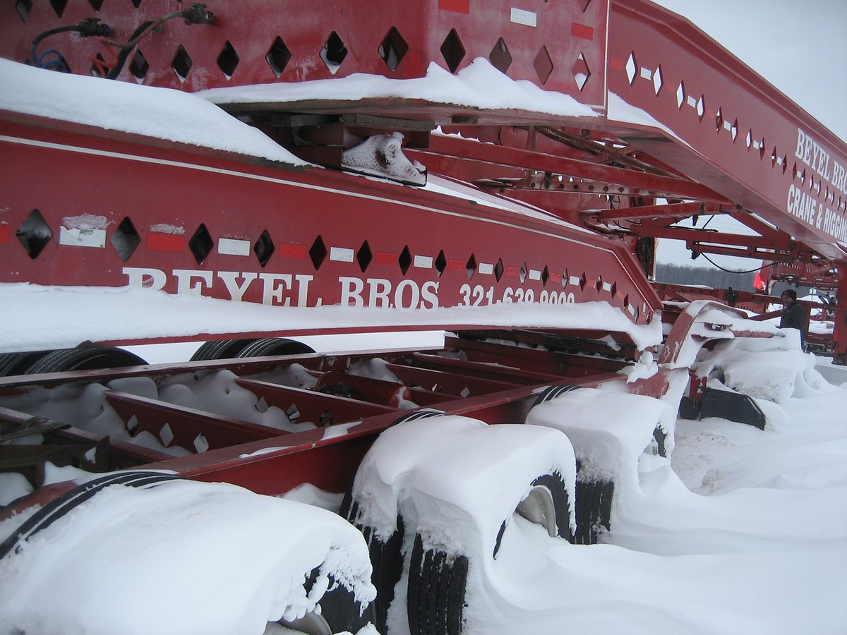BeyelCrane's tweet photo. #TBT #ThrowbackThursday This photo, from 2009, is from a move we made up north delivering a tank on a 19 axel trailer. We couldn't quite beat the storm out of town. Temperatures dipped to 18 below at one point. #NowThatsCold #Throwback #Beyel #TeamBeyel #HeavyHaul https://t.co/qElUbAULzk