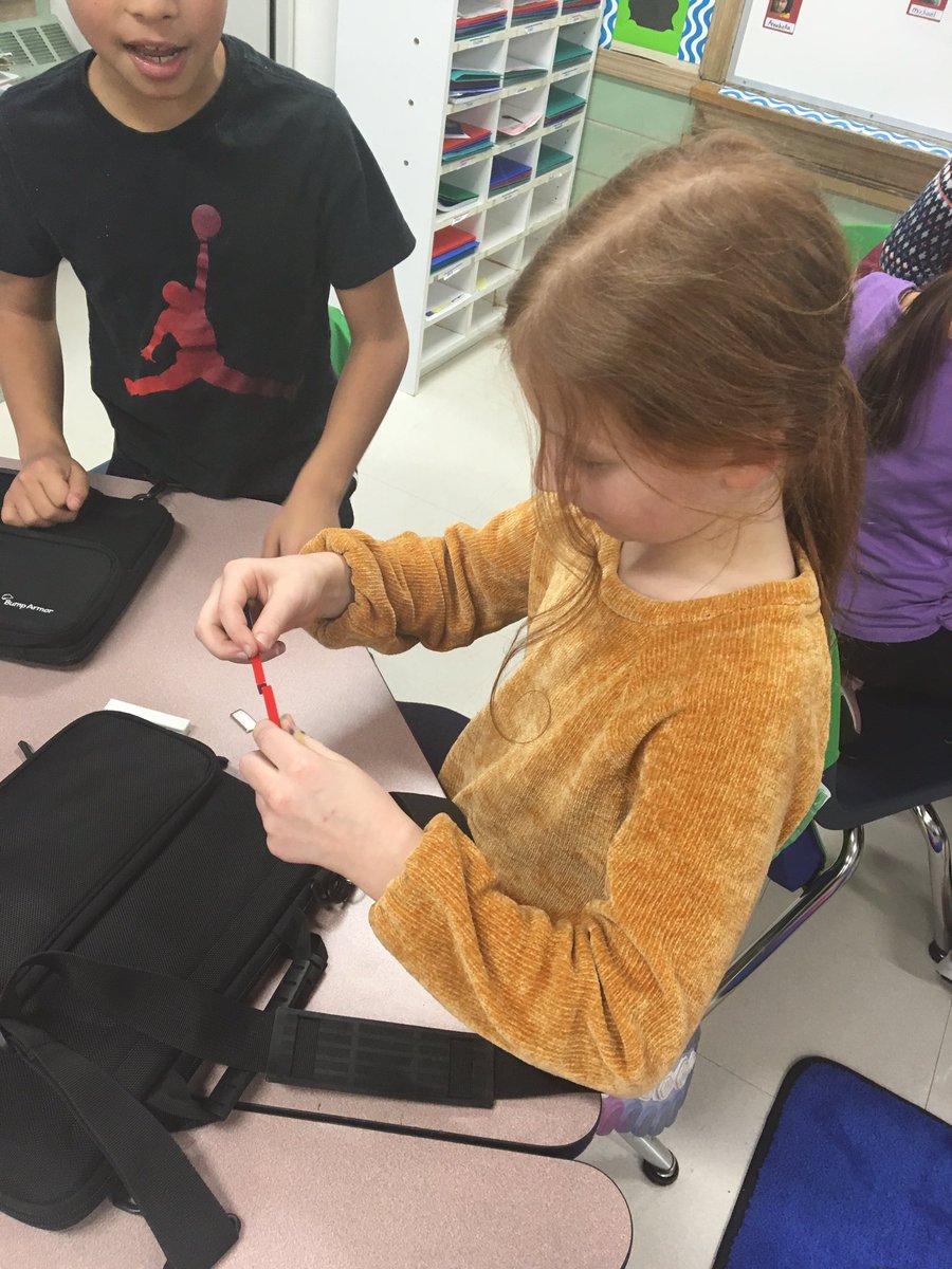 Students work with magnets to learn more about forces and motion! #CAWow #D64smiles