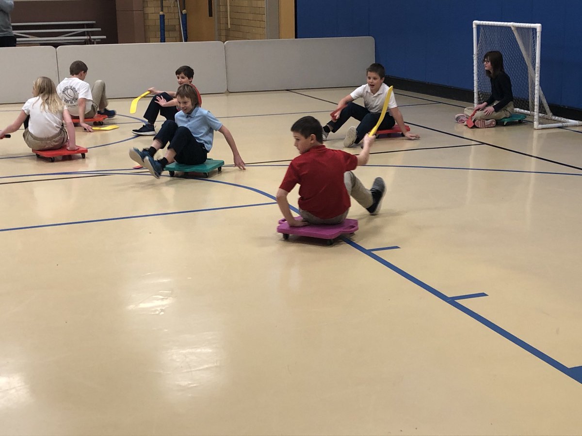 A great time playing scooter hockey in gym class today! #jp2schools