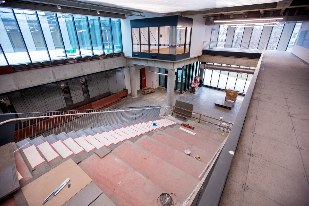 Second-floor view of the under-construction stepatorium, descending toward the Student Innovation Center's east door. Pictured at the top left is the central outdoor courtyard.