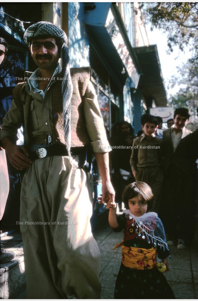 Peshmerga fighter with his daughter, Rojhilat 1980s