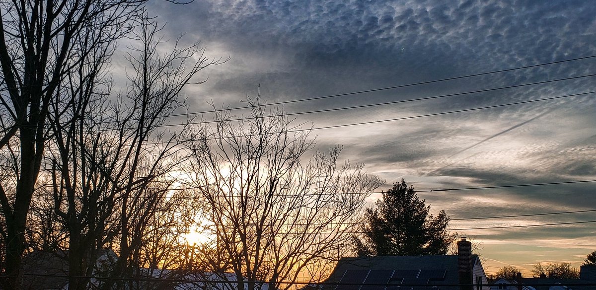 today's early sunset on 2 different ISO sensitivities accompanied by power lines and a neighbor's solar paneled roof.(#3)