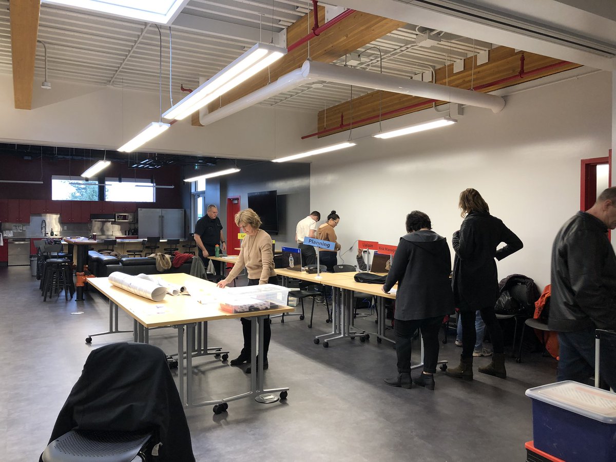 SidneyFireDept's tweet photo. @townofsidneybc staff setting up the #emergencyoperationscentre in the new @SidneyVFire building. #stafftraining #eoc #beprepared https://t.co/WZ5iIh4llO