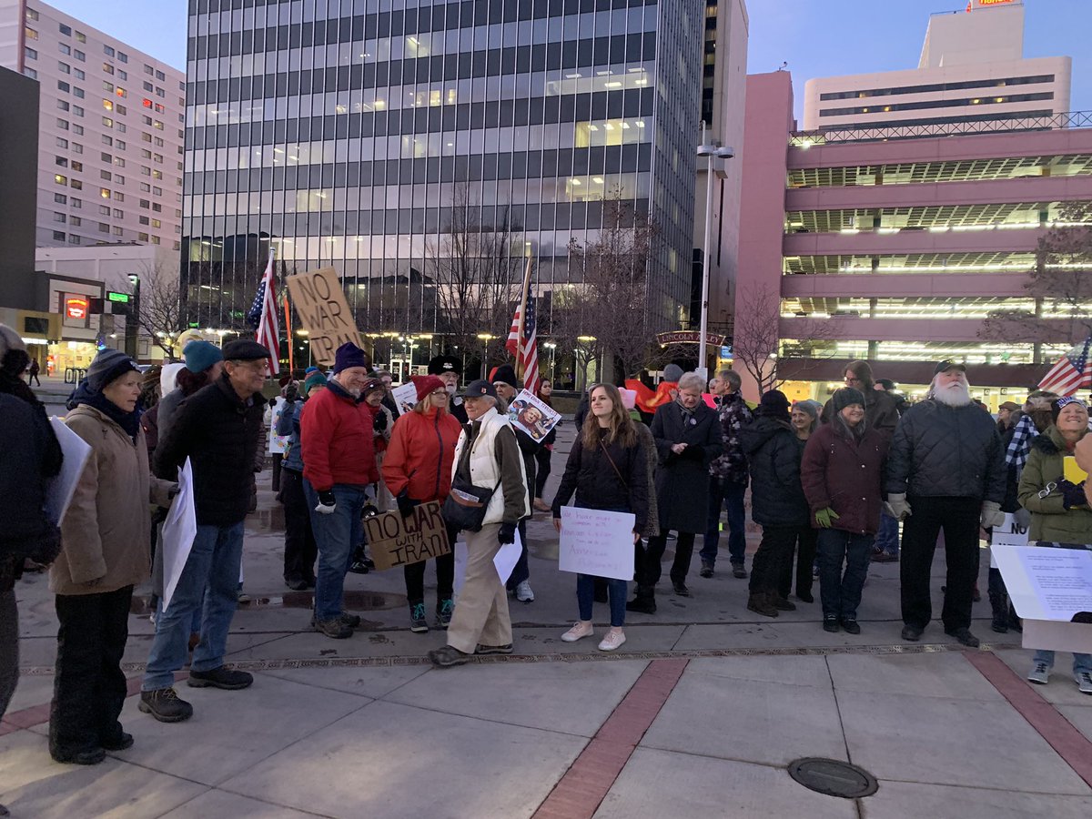 BridgetChavezTV's tweet photo. Protestors gather at the #BelieveSign in downtown Reno opposing further escalation with #Iran. More than 300 protests like this are being held nationwide. @KOLO8 https://t.co/5wkMQDNwca