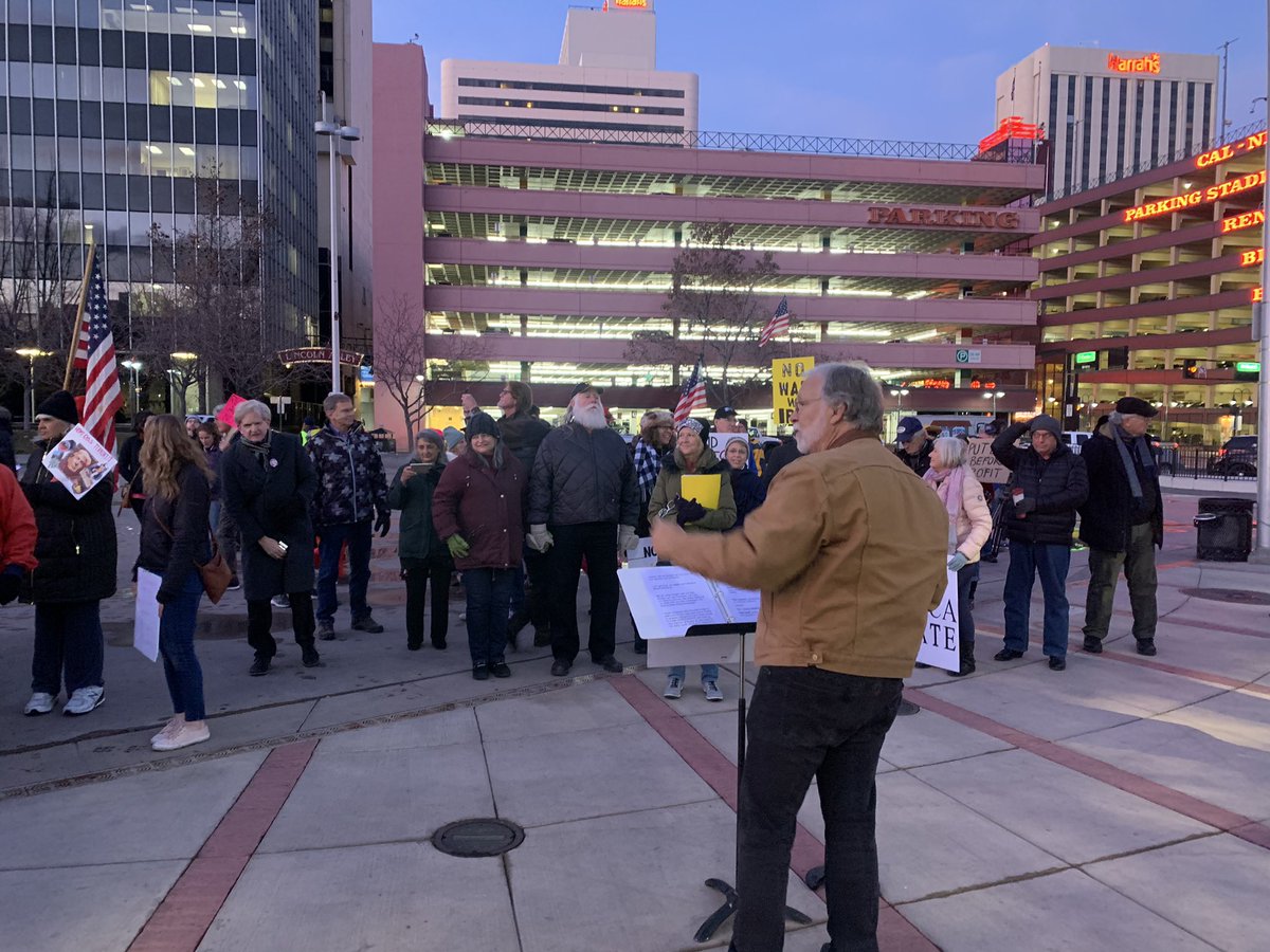 BridgetChavezTV's tweet photo. Protestors gather at the #BelieveSign in downtown Reno opposing further escalation with #Iran. More than 300 protests like this are being held nationwide. @KOLO8 https://t.co/5wkMQDNwca