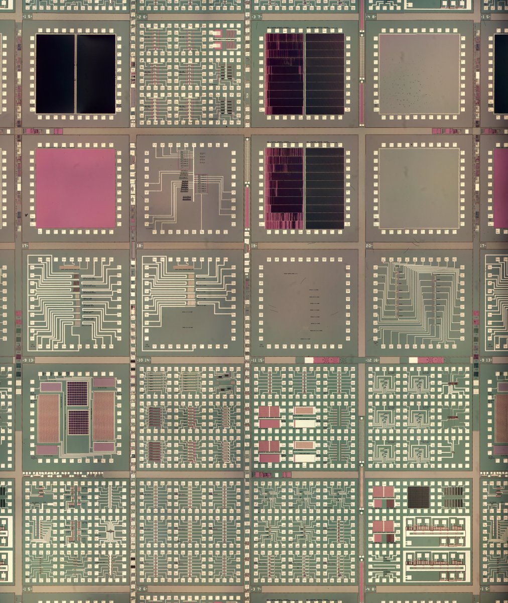 Microscope photo of silicon die showing complex test circuitry.
