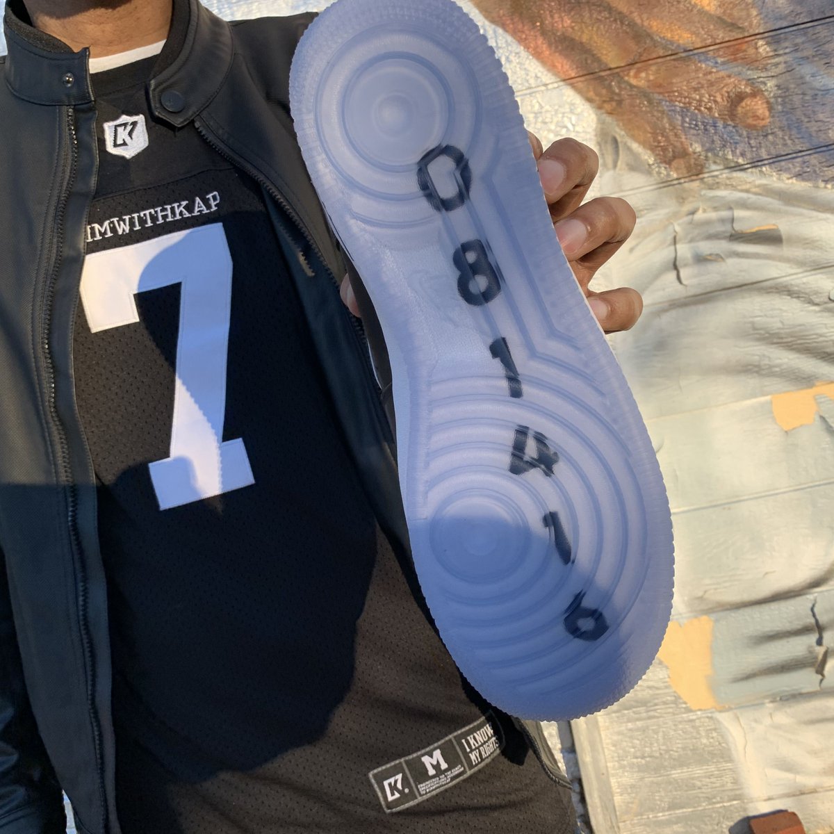 Icy soles with the date of Kap's first protest.