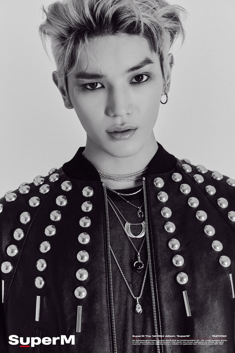the superm concept photos really blessed us by not photoshopping taeyong’s scar out