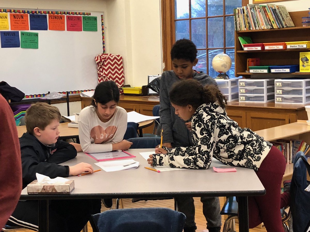 Group paraphrasing in Mrs. Brindza’s ELL class! It’s all about  learning &amp; community at Woodbury!!