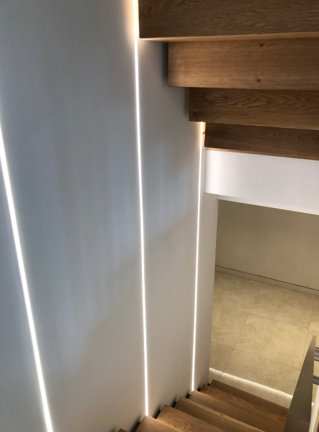 We think of every aspect when making a home. 

These staircase light beams are a remarkable inclusion that are not only practical, but very pleasing look at!