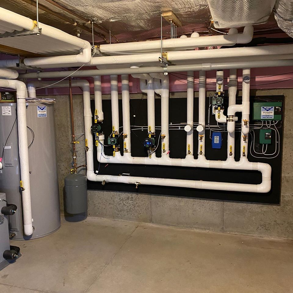 LRHVAC's tweet photo. From a recent geothermal upgrade project. This had 2 existing boilers in opposite ends of the house with a combo of radiant &amp; baseboard heat. We added the geothermal hydronic system &amp; the 2 geothermal air handlers &amp; kept 1 of the existing boilers for supplemental heat. https://t.co/O0U59coi8o
