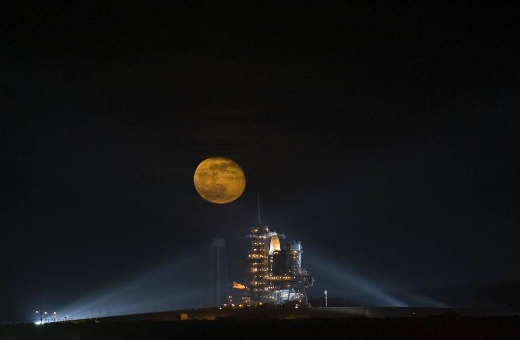 Full moon rising over the launch pad of space shuttle Endeavor. 