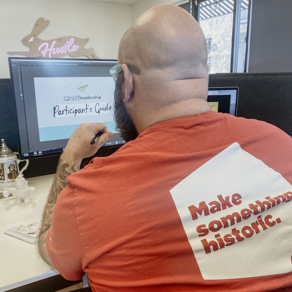 One of our designers working on some branding work for <a href="/slingshotgroup/">Slingshot Group</a>'s  #IMPROVeadership™ | #makesomethingAZ #dosomethinghistoric