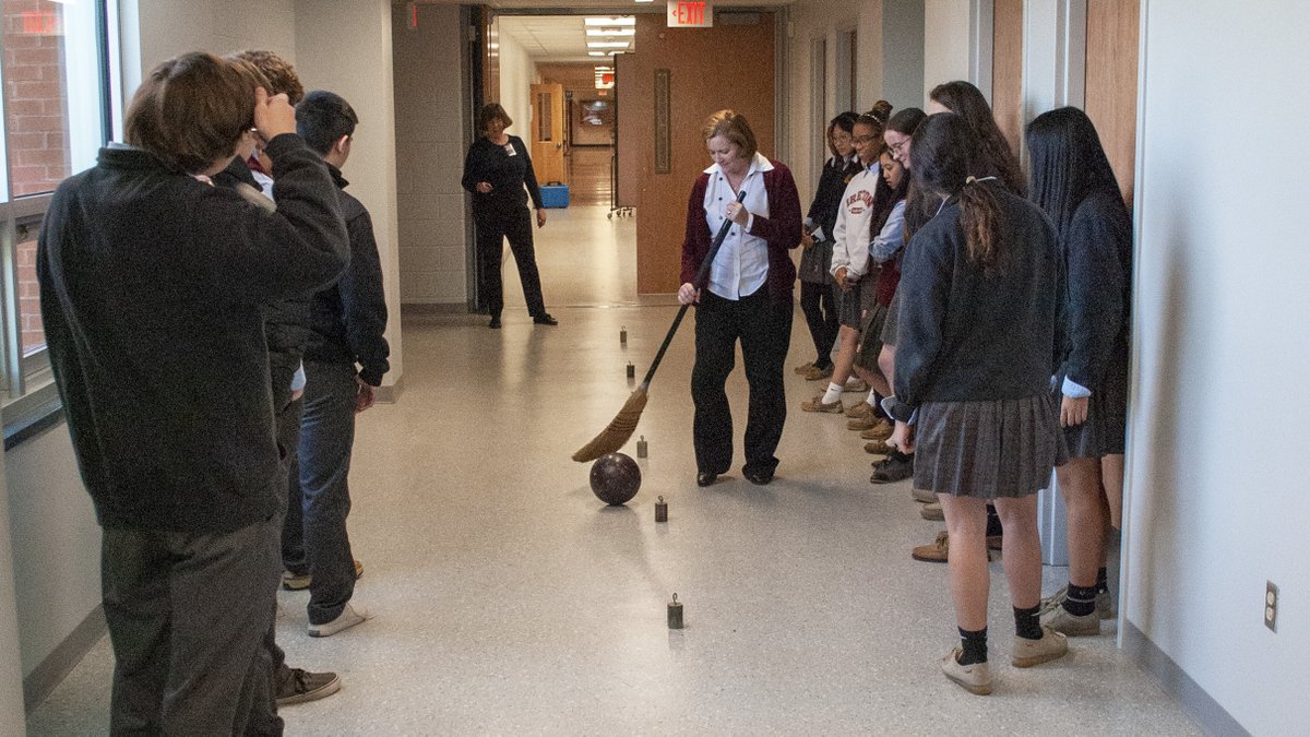 Our physics students got a fun lesson in inertia from our Wizard of Physics, longtime teacher Sonia Faletti! Our Head of School, Kathleen McNutt, even got in on the action and took a run on the bowling ball slalom course. #AdvanceAlways