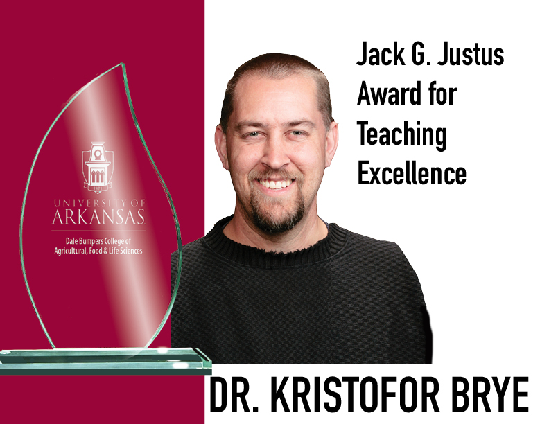 .<a href="/DeacueFields/">Deacue Fields</a> presents Crop Soils' Kris Brye with the Justus Award. Brye says "Teaching is not easy if you care about what you're doing. The students care that you care. Seeing students blossom ... is really rewarding. I look forward to every semester."