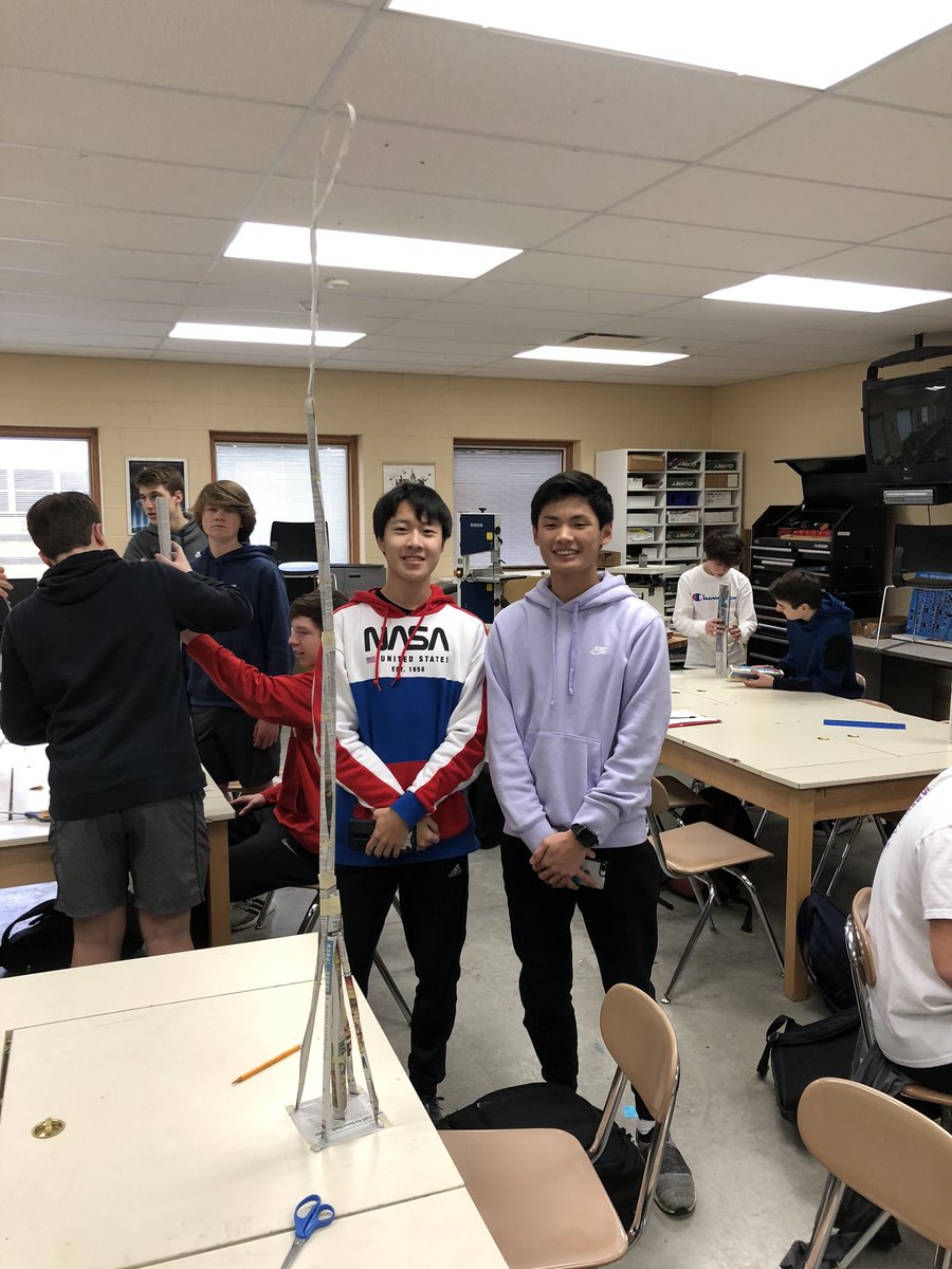Lawrence and Jordan build paper tower 57” tall given two pieces of newspaper and 12” of tape. Nice work!