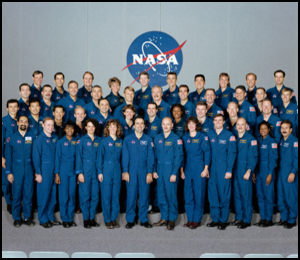 44 NASA Astronaut candidates pose for formal photo. 