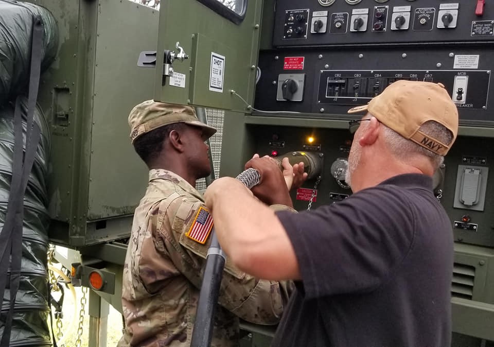 ArmyERDC's tweet image. Tom Decker and Craig White from Construction Engineering Research Laboratory delivered a Hybrid Power System to the 130th Engineer Brigade in Hawaii. ERDC developed the HPS as a means of increasing fuel efficiency on the battlefield. #CERLab