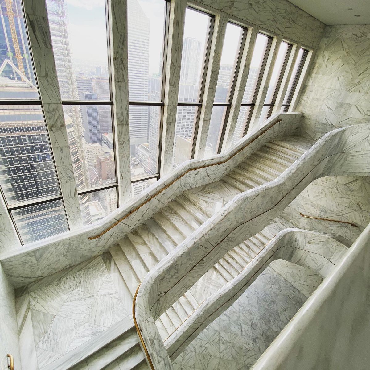 AIO_NYC's tweet photo. A masterpiece marble staircase atop 550 Madison. Connecting three (3) 25,0000 square foot floors, this is one of the most architecturally significant existing office space features in NYC.  A feature that will never be duplicated due to cost. https://t.co/Uo6YMmSXqG