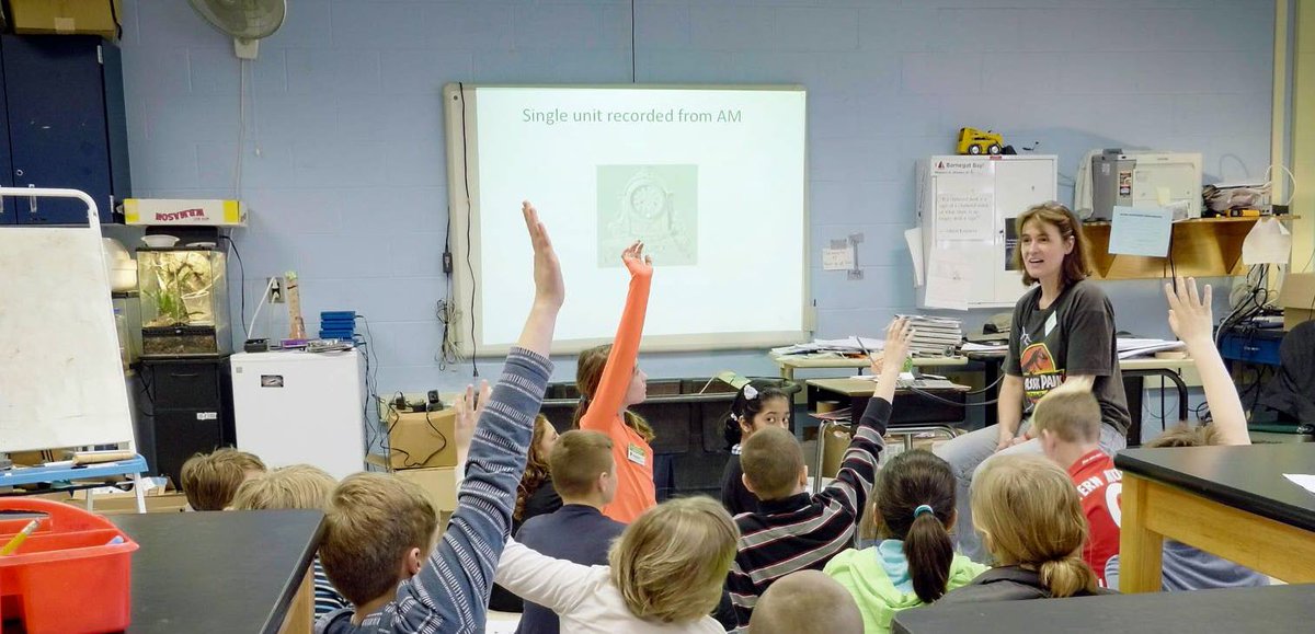 Professor Sabine Kastner speaks to a group of children