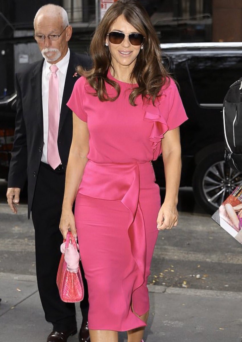 ElizabethHurley's tweet photo. You can buy these gorgeous pink outfits AND help find a cure for breast cancer. Check out @luxanthropy where many dresses, bags &amp; shoes that I’ve worn are raising funds for @BCRFcure 💗💗💗 https://t.co/BrnwP9Koa6 https://t.co/x9ACMOPFNC