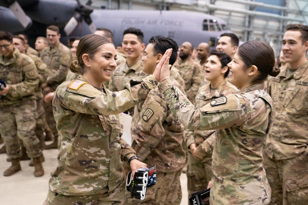 The_USO's tweet photo. With a show from Sr. Enlisted Advisor to the Chairman of @thejointstaff Ramon Colon-Lopez, MMA fighter @ilimanator, country band @LOCASHmusic and others, the USO New Year's tour saluted our troops in Poland. #USOTour2020 📸: @deptofdefense photos by @USArmy Sgt. James K. McCann https://t.co/cRlj7vcOni