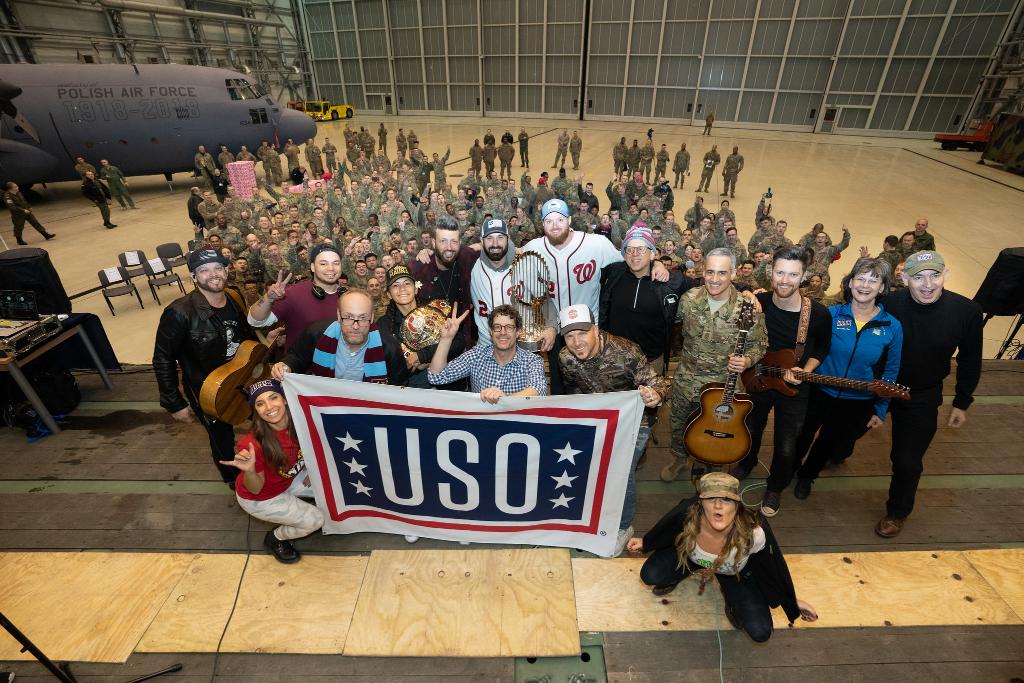 The_USO's tweet photo. With a show from Sr. Enlisted Advisor to the Chairman of @thejointstaff Ramon Colon-Lopez, MMA fighter @ilimanator, country band @LOCASHmusic and others, the USO New Year's tour saluted our troops in Poland. #USOTour2020 📸: @deptofdefense photos by @USArmy Sgt. James K. McCann https://t.co/cRlj7vcOni