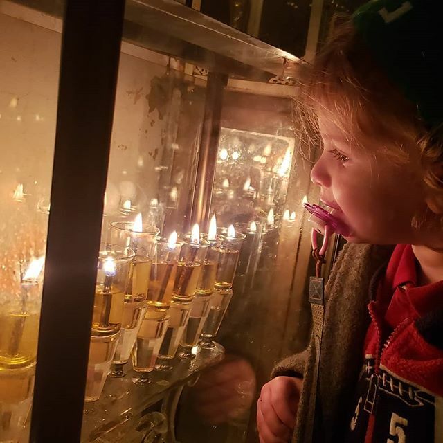 jewlicious's tweet photo. Last night of #Hanukkah in #Jerusalem
Baby #Jewlicious has the candles reflected in his eyes. What's he thinking about? Chocolate donuts probably. https://t.co/PlqZohvhDX