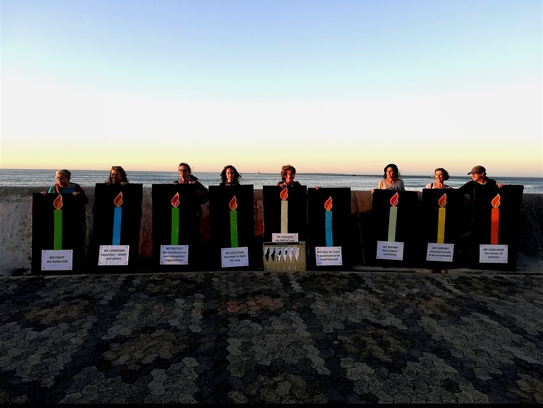 SAJFP_'s tweet photo. On the eighth day of Hanukkah, we protested the lack of freedom of expression in Israel /Palestine, inspired by our comrades in the USA @jvplive #RekindleResistance https://t.co/tMhjKIue7f
