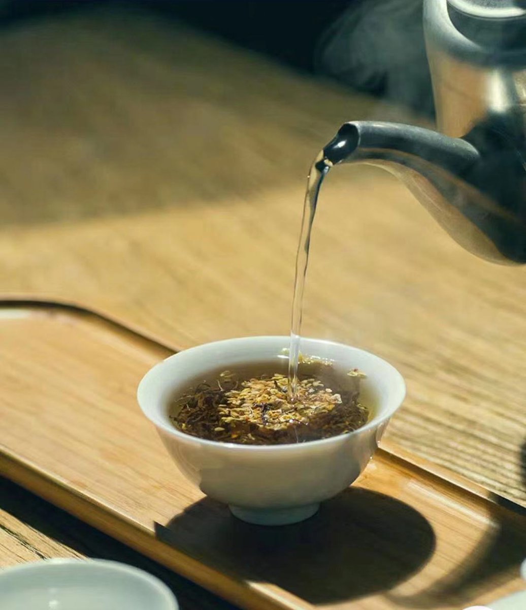 Taking a moment to have a try osmanthus black tea.