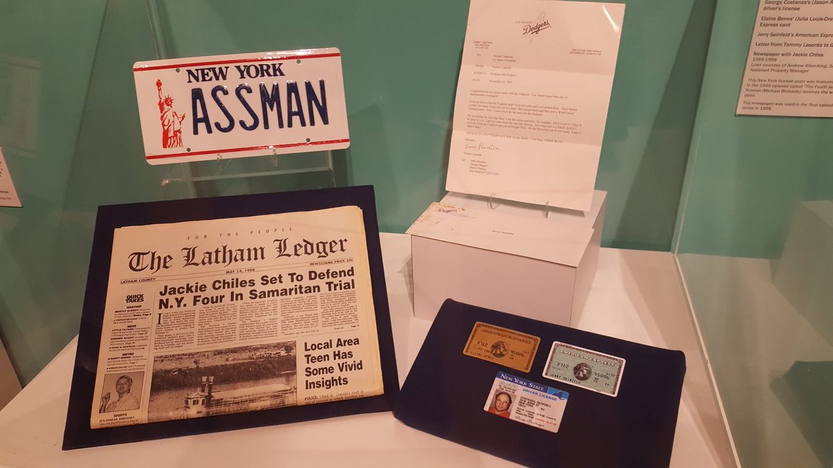 sarahkendzior's tweet photo. The Bill Clinton Museum in Little Rock has Mulder and Scully's FBI badges, Buffy's stake, the Seinfeld ASSMAN license plate, Garth's shirt from Wayne's World, and the couch from Friends https://t.co/V0M6TrgVBi