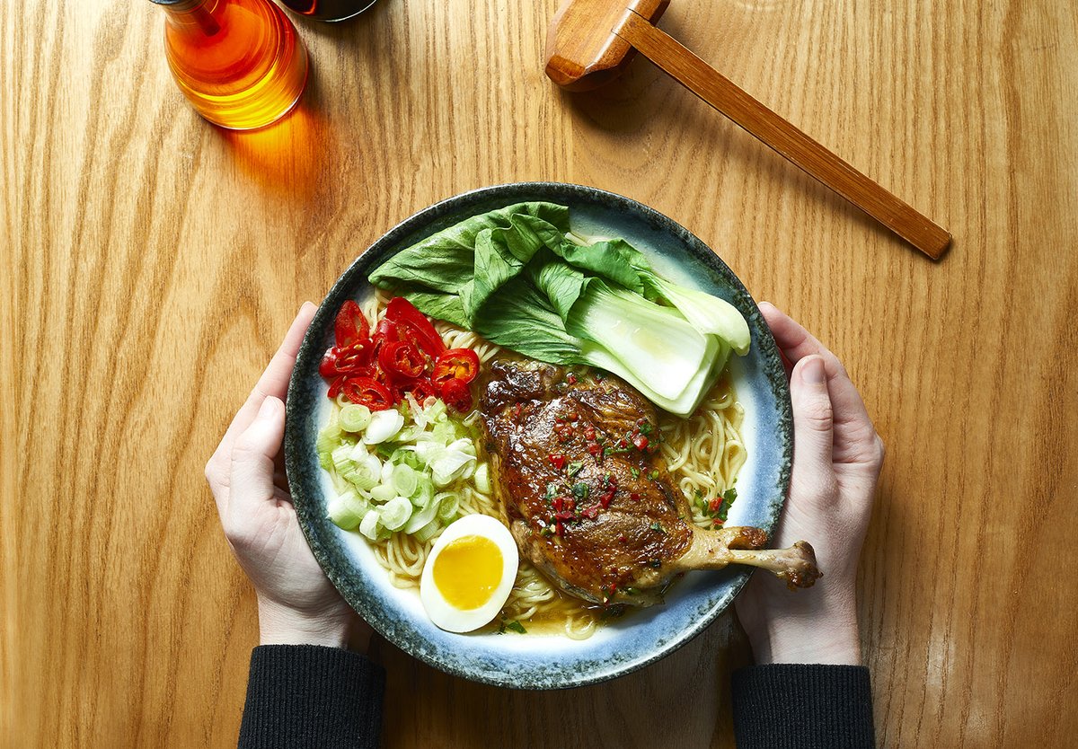 the holiday might be winding down but let us present you with one of our new favorite ramens of 2019. a crispy duck leg garnished with cilantro + ponzu sauce, half a tea-stained egg, bok choy, chilies + scallions all floating in a bed of noodles + light vegetable broth 🍜