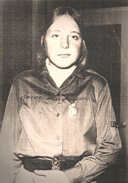 Here's a picture of a young Angela Merkel in 'Freie Deutsche Jugend' shirt Freie Deutsche Jugend (Free German Youth) was the Communist youth organization of the government of the German Democratic Republic (East Germany).