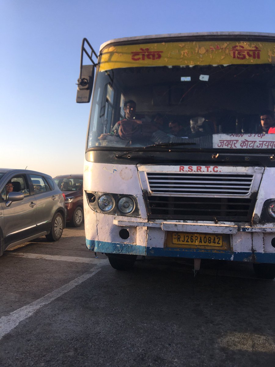 IndiaFRP's tweet photo. @RSRTC1 On 28th Dec 2019 I was in my car with my family. I stopped in the queue on shivdaspura toll. In the next lane this bus was also in the lane. As my lane proceed he waned to change the lane and tried to enter in front of me . https://t.co/kuFSbRVJsV