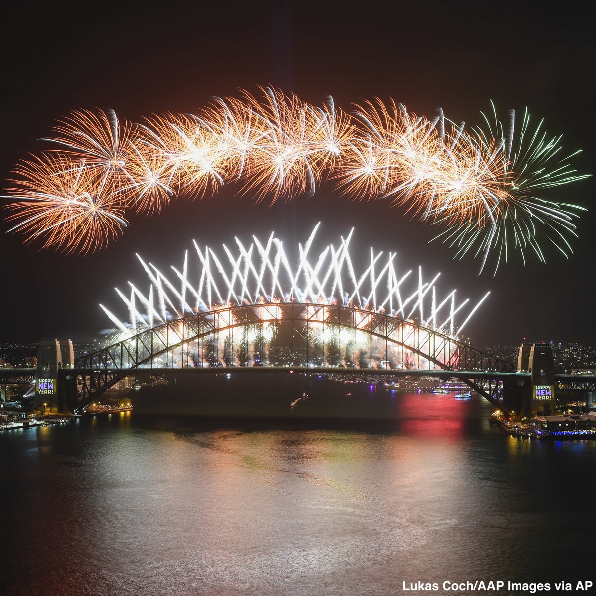 ABC's tweet image. HAPPY NEW YEAR: Australia, South Korea and more ring in 2020 with astonishing fireworks displays. abcn.ws/36e2QII #NewYearsEve