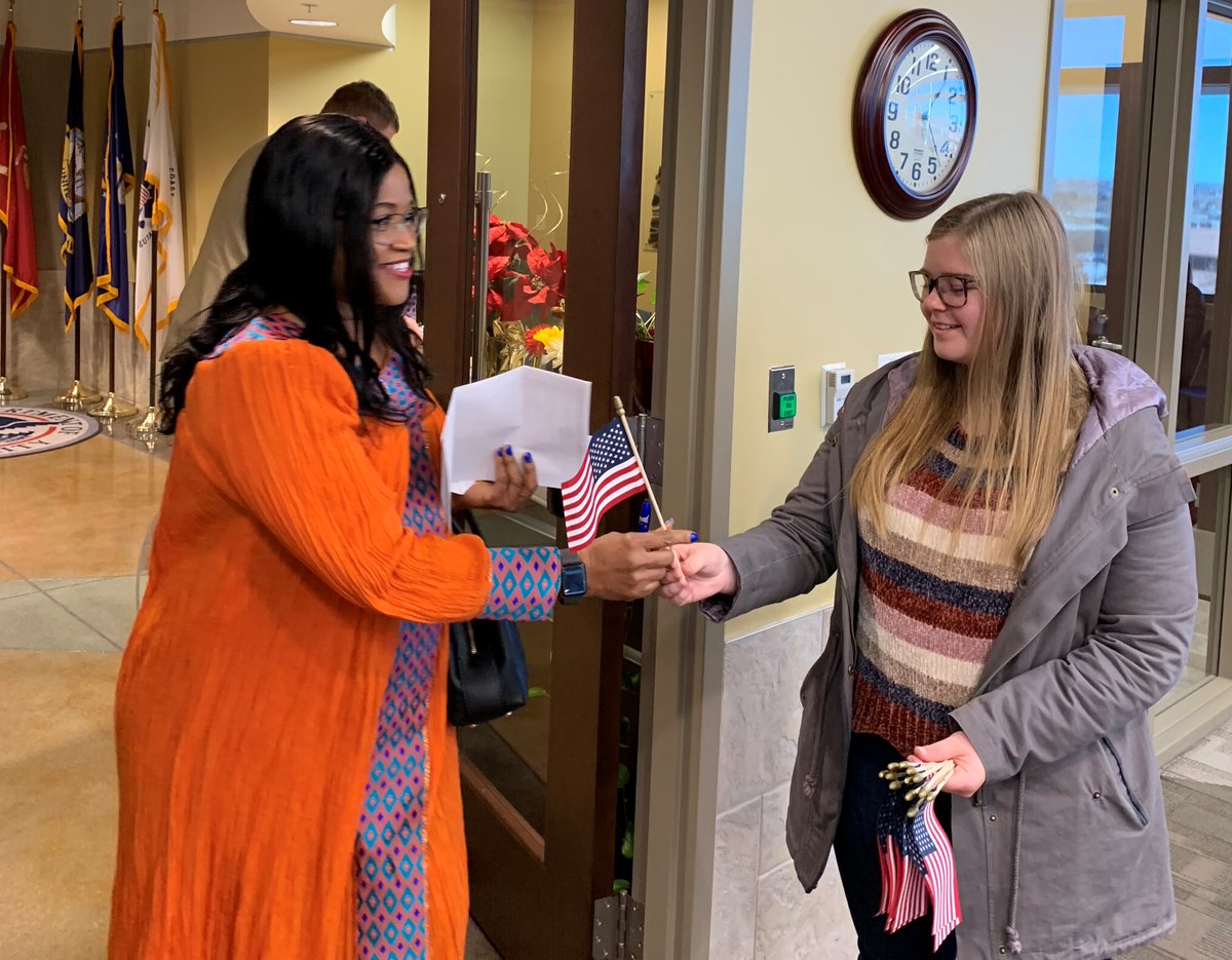 Beffry, from #SierreLeone who lives in #Denver, will celebrate her first #HappyNewYear as a #NewUSCitizen by cooking lots of food to celebrate with family. She received a flag from the Daughters of the American Revolution at her ceremony.