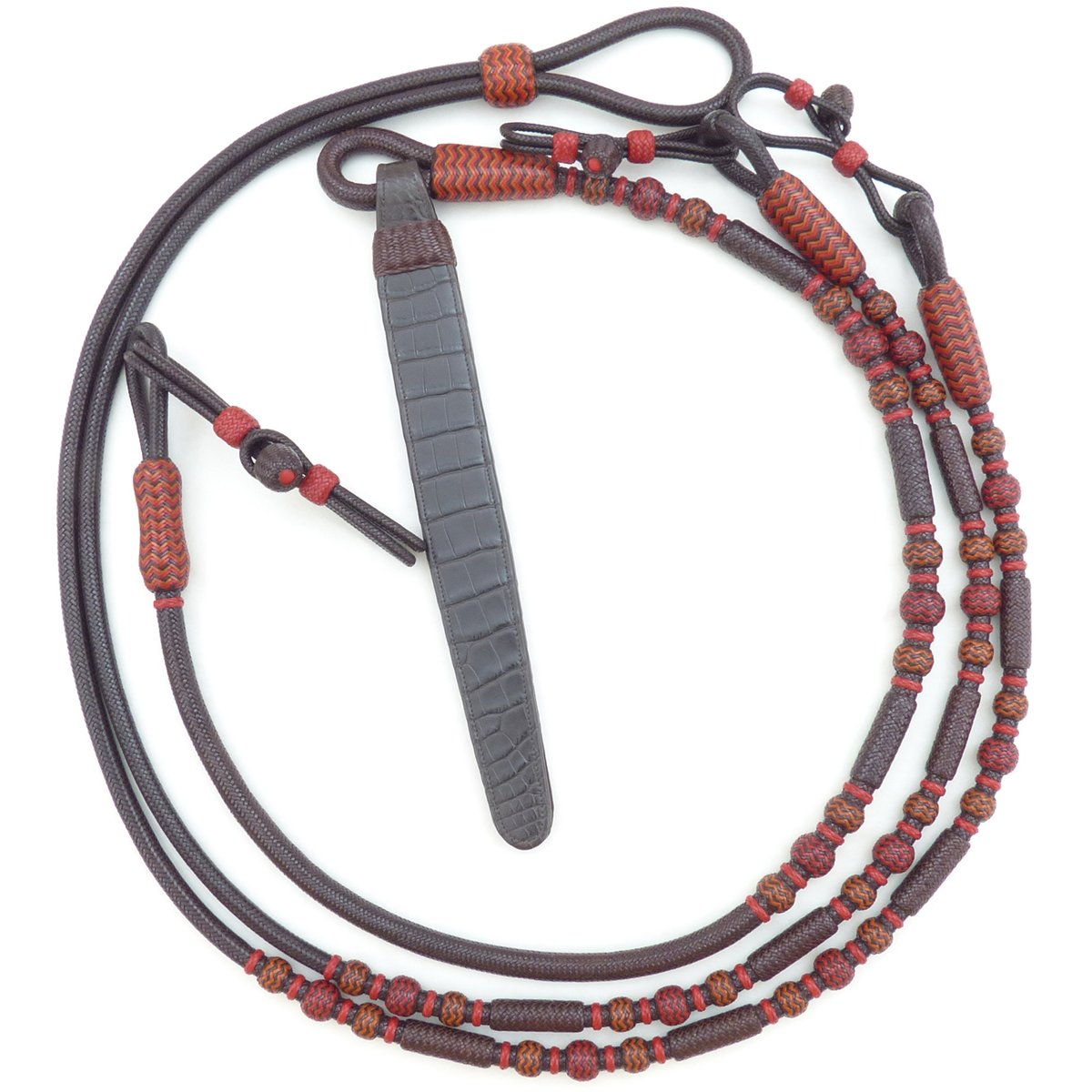 WesternDesign's tweet photo. Ross Custom Leather works with leather braiding, a traditional trade, and transforms everyday items into works of art. Pictured here: 24/32 Braid Kangaroo Leather Romal Reins with Alligator Leather Popper. https://t.co/EqcA7M792N https://t.co/Qznq9NLQ6i
